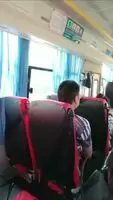 Chinese cutie flashing her tits on a bus