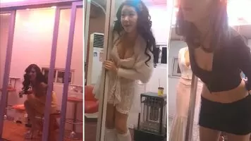 Window shopping at a red light district in Seoul