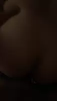From behind