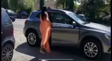Serbian watermelon lady with two melons