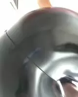 Shiny leggings facesitting