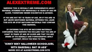 Kinky Niky Halloween schoolgirl with baseball bat in ass