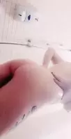 Ginger getting soapy in the gym shower after a long work out for