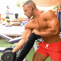 Working the biceps at outdoor gym ...