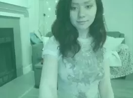 Taking off her top