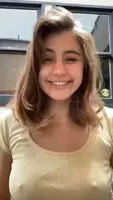 Lia Marie Johnson showing her tattoo... and her hard nipples