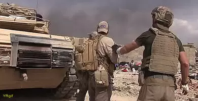Marines extract a little girl from the kill zone
