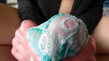 Handjob ends with him cumming in his wife's panties.