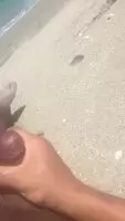 Cumming on the beach