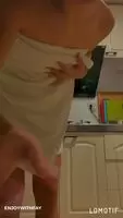 Behind the towel