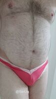 Bi Man pissing his pretty pink frilly panties.
