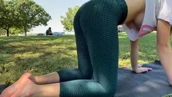 Braless yoga in the park