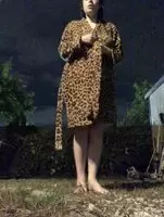 Stripping nude in my apartment backyard. There’s a parking lot light that makes it so bright!