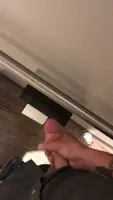 Squirting a load out in the public bathroo