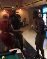 Going too far with her guy while dancing.