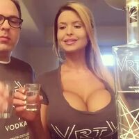 Busty Baby Doll doing shots